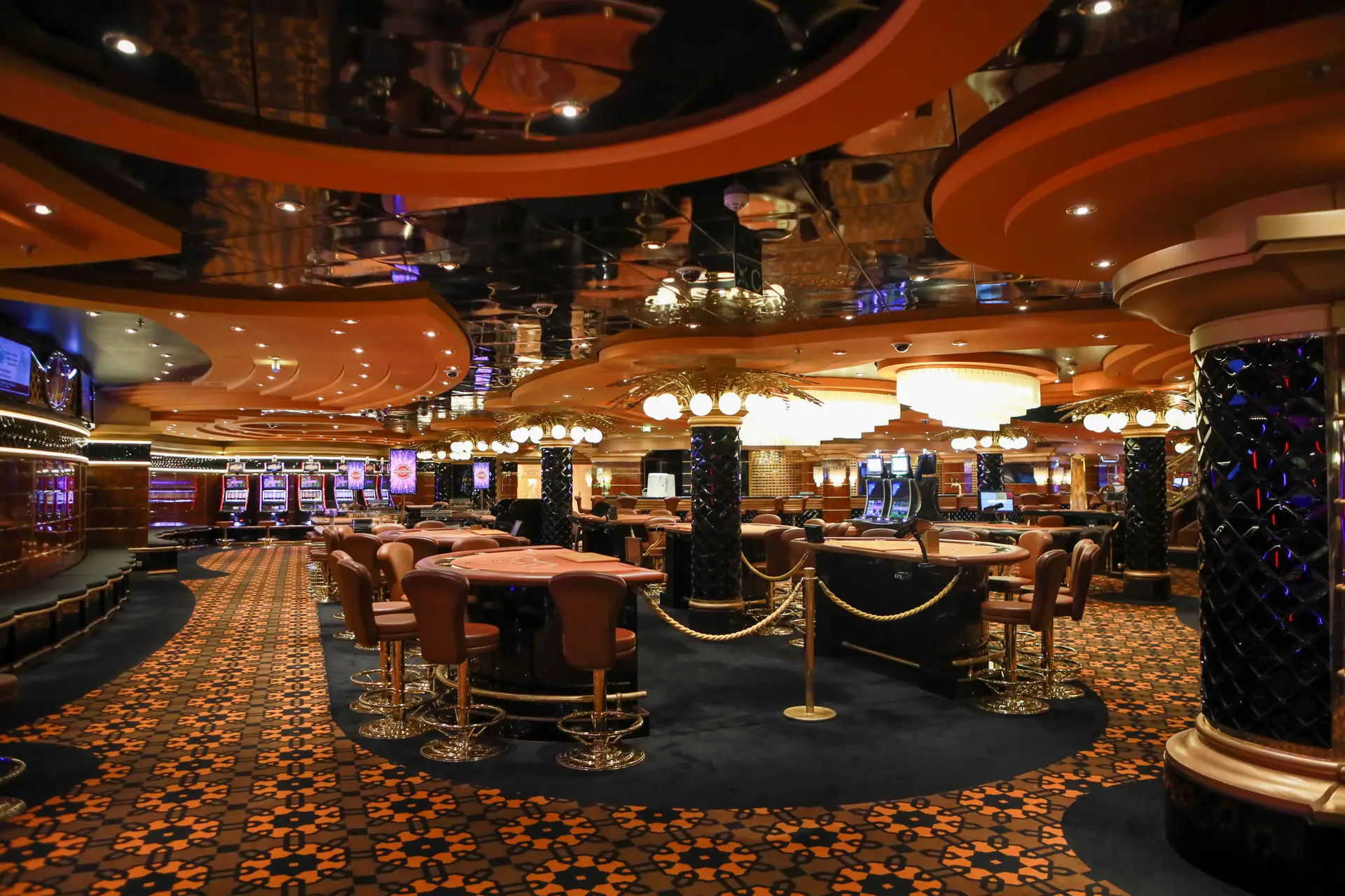 Atmospheric dusk view of the MirevellangrandHaven casino floor with elegant lighting